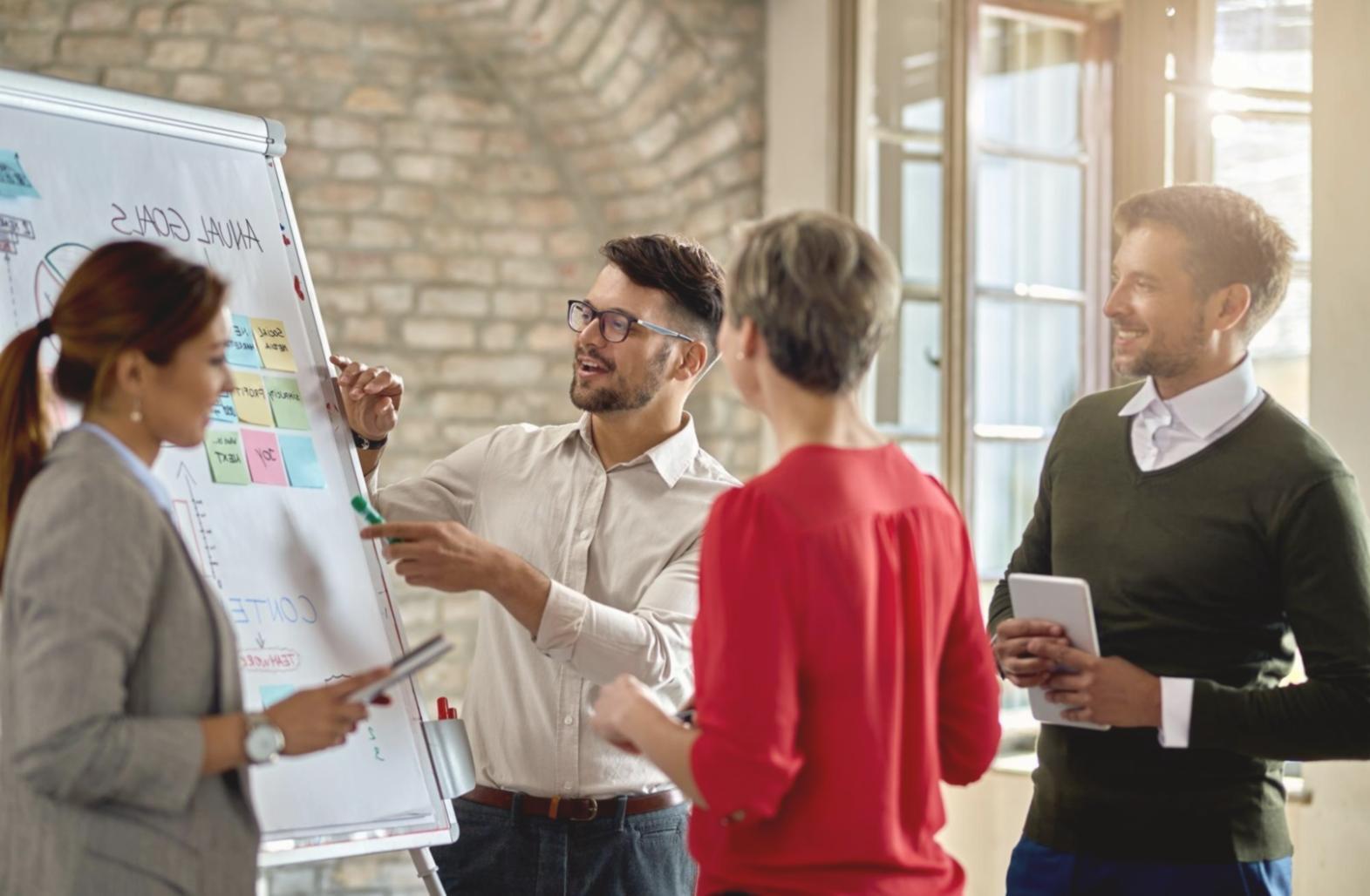 Business professional reviewing financial charts and reports