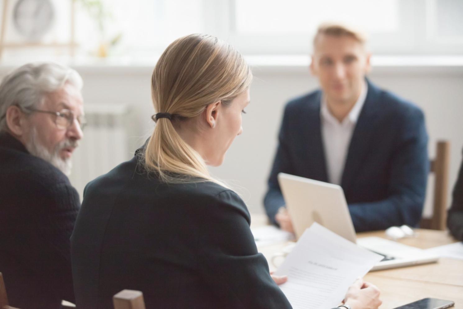 Student analyzing financial statements and cash flow documents